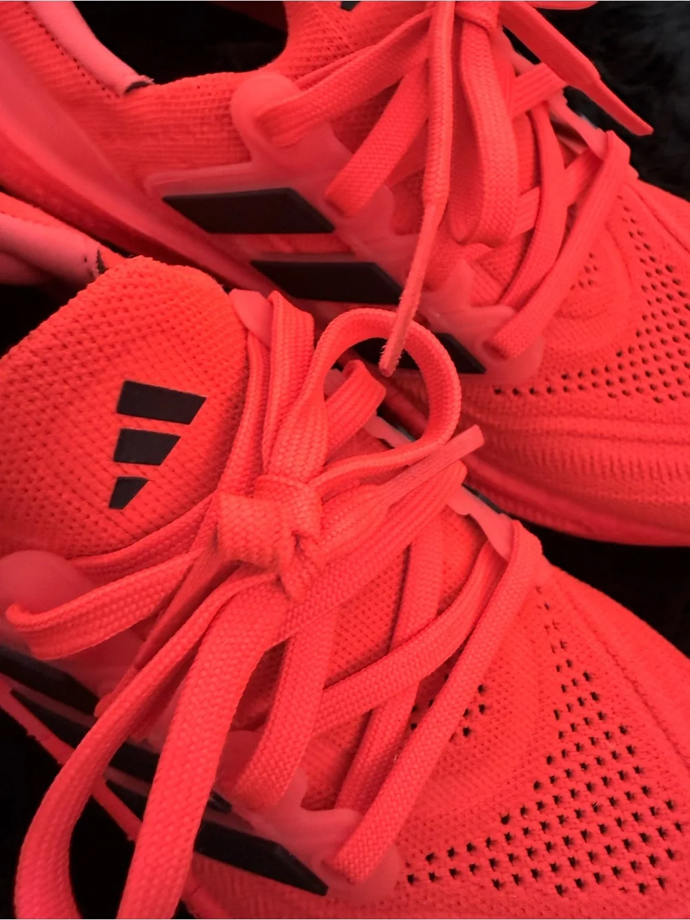 adidas red orange Ultraboost Running Sneakers.